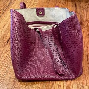 Moderately used Fuschia faux snakeskin tote